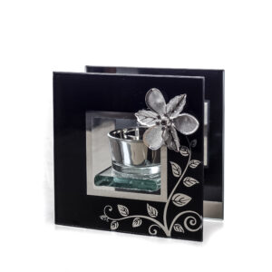 Tea Light with silver flower on black square mirrored glass